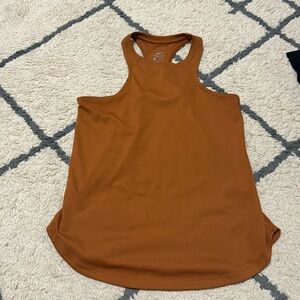 Burnt orange nike tank top.  Size medium